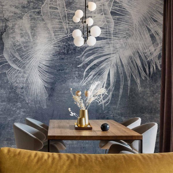 Wall Mural - Abstraction with nature - exotic leaves on a blue background with pattern